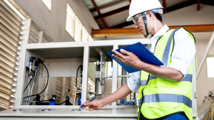 Professional electrician providing AC repair services in Islamabad and Lahore, inspecting electrical wiring for safety and functionality during a residential project. Expert electrical contractor handling both commercial and residential needs to ensure quality service.